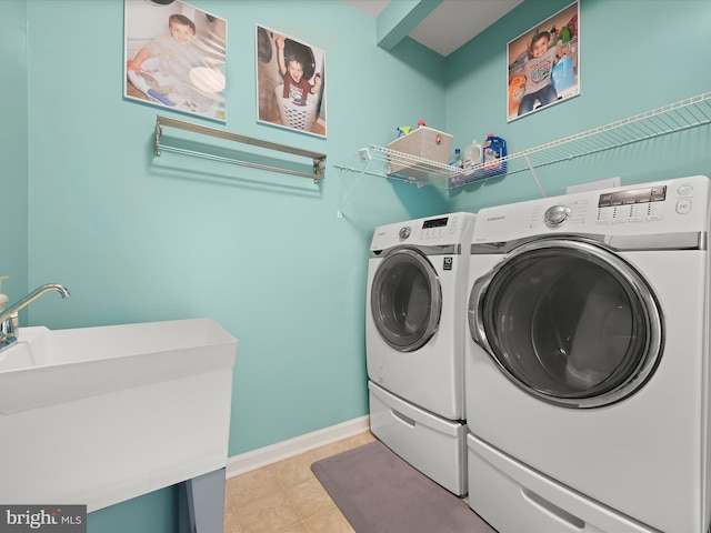 5910 Constance Way, New Market, MD 21774 - laundry area featuring washing machine and clothes dryer and light tile patterned flooring