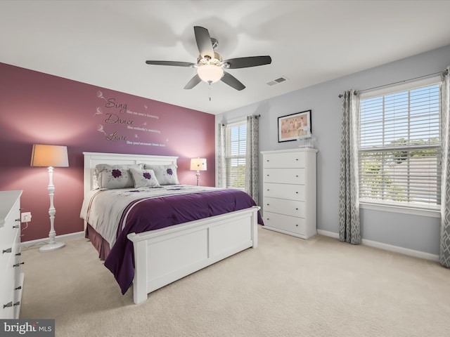 5910 Constance Way, New Market, MD 21774 - carpeted bedroom with multiple windows and ceiling fan