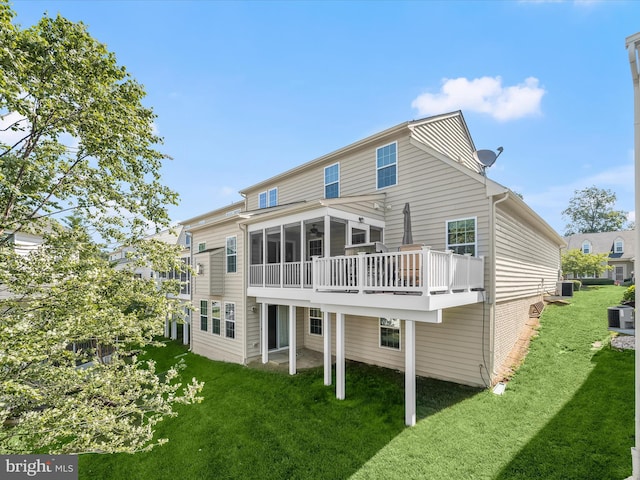5910 Constance Way, New Market, MD 21774 - rear view of house featuring a lawn, a sunroom, and a wooden deck