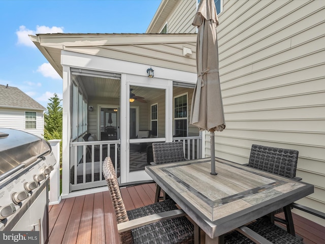 5910 Constance Way, New Market, MD 21774 - wooden deck with a sunroom, outdoor dining area, and grilling area