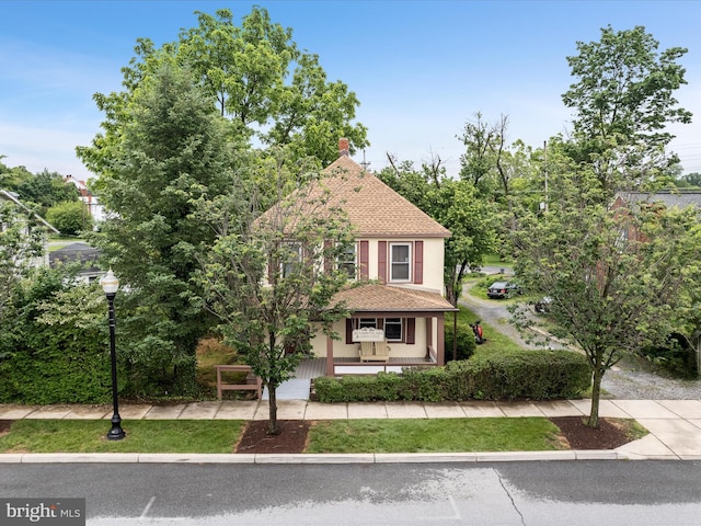 507 S Fairfax Blvd, Charles Town, WV 25414 - view of front facade with a porch, stucco siding, and roof with shingles