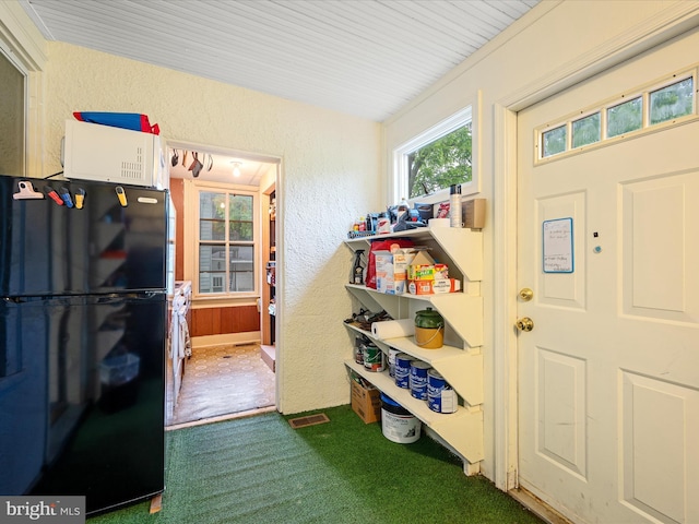 507 S Fairfax Blvd, Charles Town, WV 25414 - mudroom with carpet and a textured wall