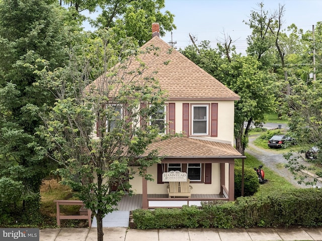 507 S Fairfax Blvd, Charles Town, WV 25414 - view of front of property featuring roof with shingles, a porch, and a chimney
