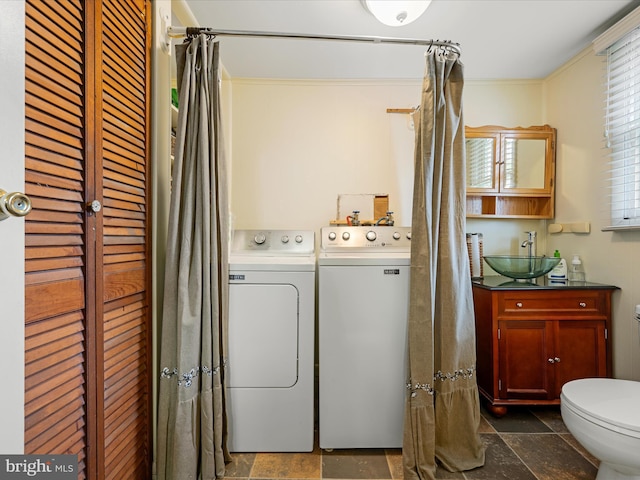 507 S Fairfax Blvd, Charles Town, WV 25414 - washroom featuring washing machine and clothes dryer and stone tile floors