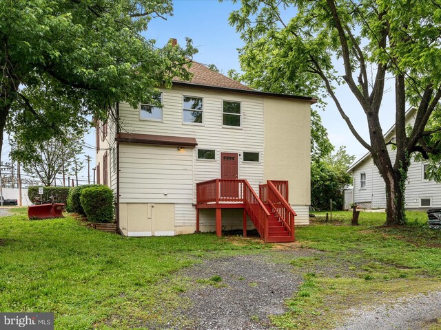 507 S Fairfax Blvd, Charles Town, WV 25414 - back of house featuring a lawn