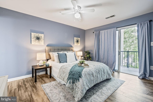 20408 Shore Harbour Dr Unit 5-C, Germantown, MD 20874 - bedroom featuring access to exterior, wood finished floors, and a ceiling fan