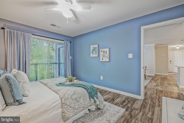20408 Shore Harbour Dr Unit 5-C, Germantown, MD 20874 - bedroom featuring wood finished floors, access to exterior, and ceiling fan