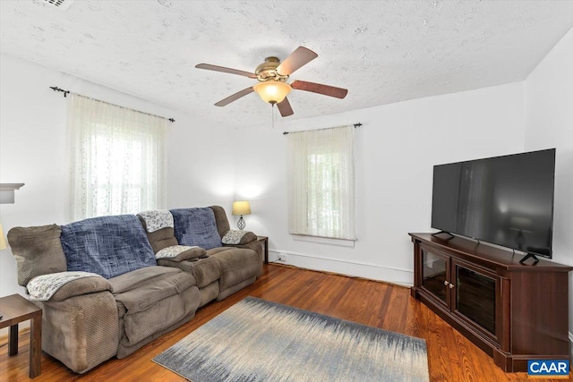 614N Commerce St, Culpeper, VA 22701 - living room with plenty of natural light, a textured ceiling, wood finished floors, and a ceiling fan