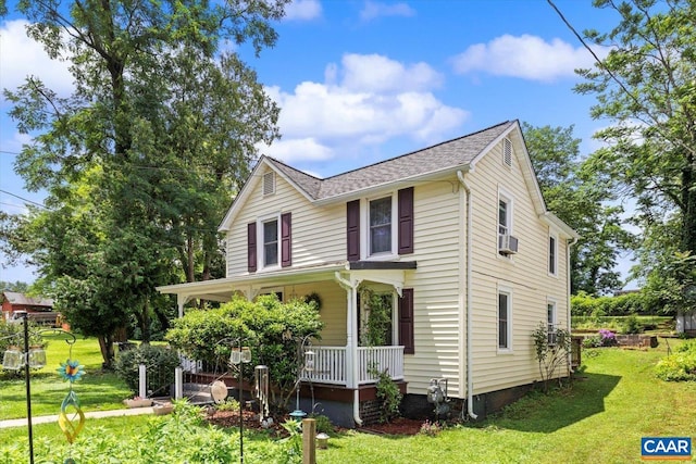 614N Commerce St, Culpeper, VA 22701 - view of front of home featuring covered porch, a front yard, cooling unit, and a shingled roof