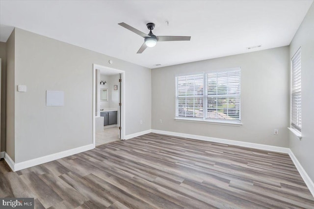 6116 Baldridge Ter, Frederick, MD 21701 - unfurnished room featuring wood finished floors and a ceiling fan
