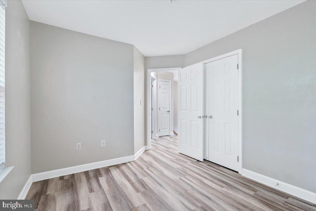 6116 Baldridge Ter, Frederick, MD 21701 - unfurnished bedroom with wood finished floors and a closet