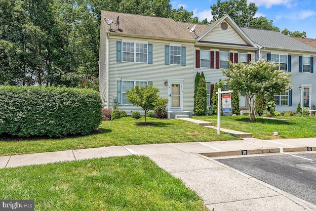 6116 Baldridge Ter, Frederick, MD 21701 - townhome / multi-family property with uncovered parking and a front yard