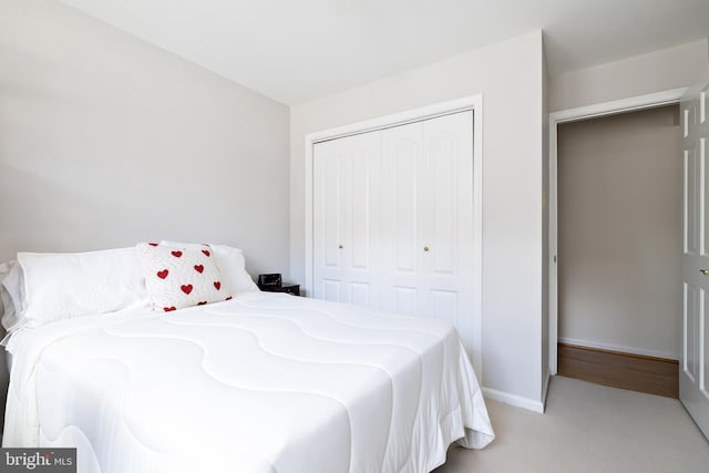 14 Haddonfield Cmns Unit 14, Haddonfield, NJ 08033 - bedroom with light colored carpet and a closet