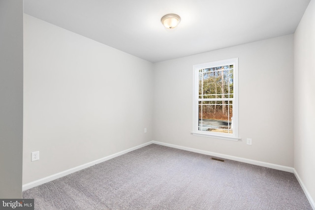 916 Lakeview Dr, Colonial Beach, VA 22443 - empty room with carpet flooring and baseboards
