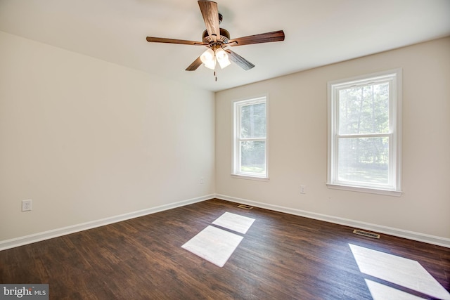 916 Lakeview Dr, Colonial Beach, VA 22443 - empty room featuring dark wood-style floors and a ceiling fan