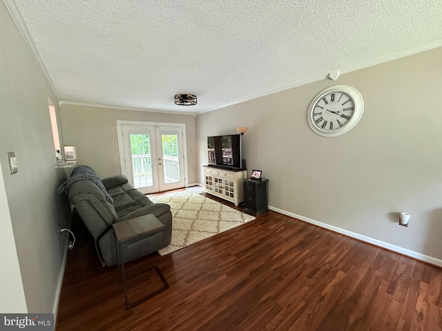 4123 Cassell Blvd, Prince Frederick, MD 20678 - living area with ornamental molding, a textured ceiling, wood finished floors, and french doors