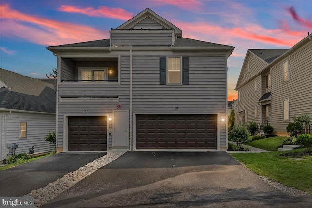 519 S Media Way, Media, PA 19063 - multi unit property featuring a garage, driveway, and roof with shingles