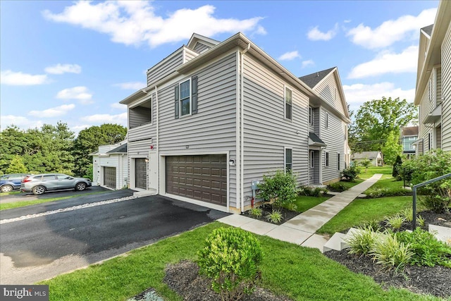 519 S Media Way, Media, PA 19063 - view of home's exterior featuring an attached garage and driveway