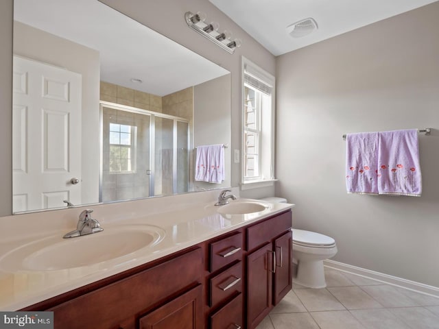 24847 Mason Dale Ter, Chantilly, VA 20152 - bathroom featuring double vanity, a shower stall, and tile patterned flooring