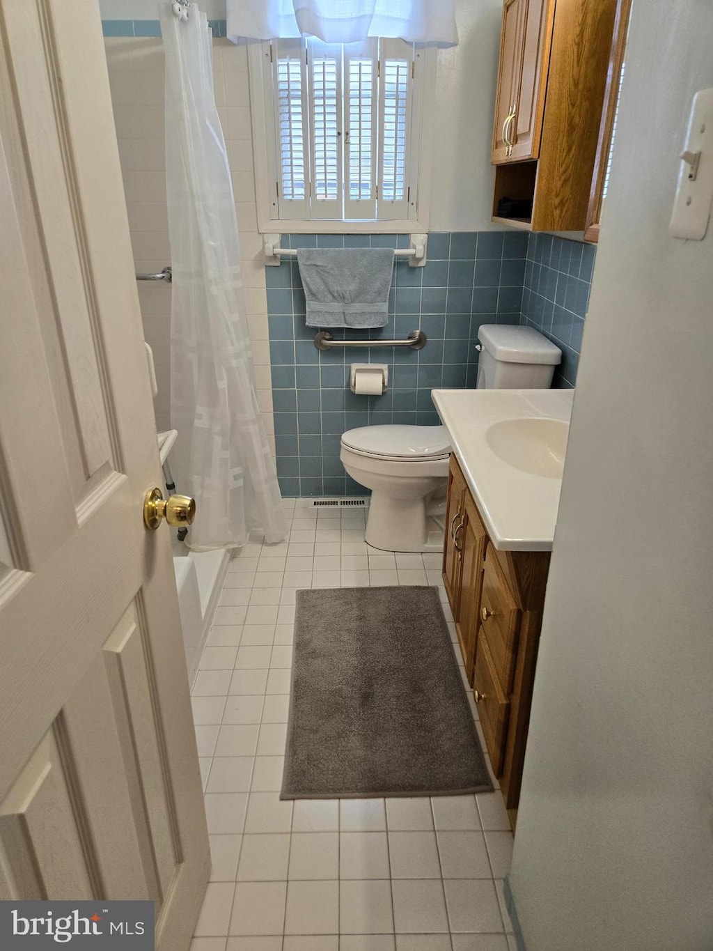 3277 Sudlersville S, Laurel, MD 20724 - bathroom with tile patterned flooring, vanity, and tile walls