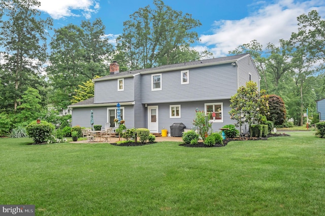 3 Cooper Ct, Sicklerville, NJ 08081 - rear view of house featuring a patio, a chimney, and a yard