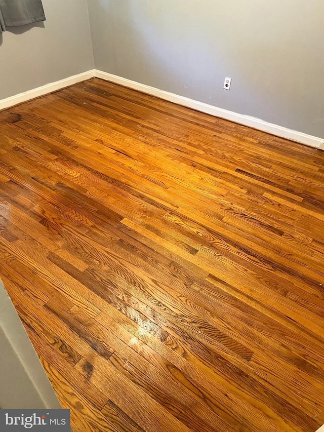 5904 Willet Ave, Baltimore, MD 21206 - spare room with dark wood-style flooring and baseboards