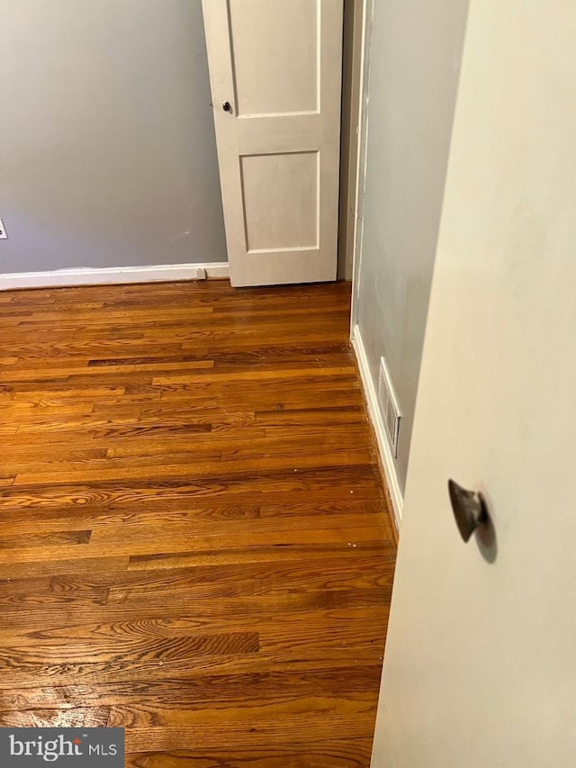 5904 Willet Ave, Baltimore, MD 21206 - spare room with dark wood-style flooring and baseboards