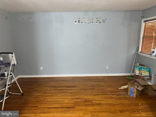 5904 Willet Ave, Baltimore, MD 21206 - empty room with wood finished floors and baseboards