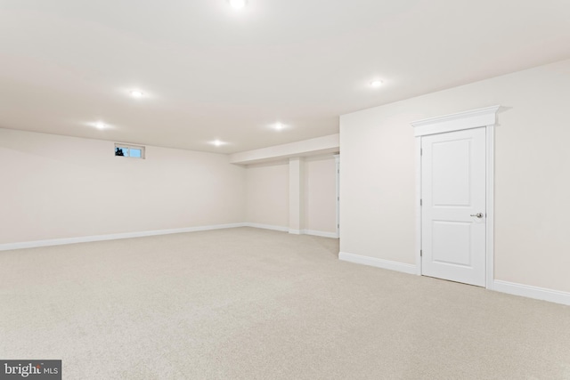 121 Lillian Ct, Fredericksburg, VA 22406 - finished basement with light colored carpet and recessed lighting