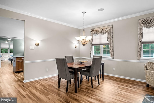 5 Fisher Ct, Sewell, NJ 08080 - dining area with light wood-style floors, crown molding, plenty of natural light, and a chandelier