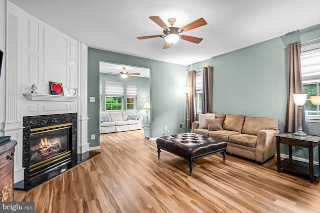 5 Fisher Ct, Sewell, NJ 08080 - living room featuring wood finished floors, a ceiling fan, and a fireplace