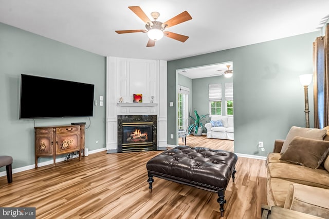 5 Fisher Ct, Sewell, NJ 08080 - living area featuring ceiling fan, wood finished floors, and a premium fireplace