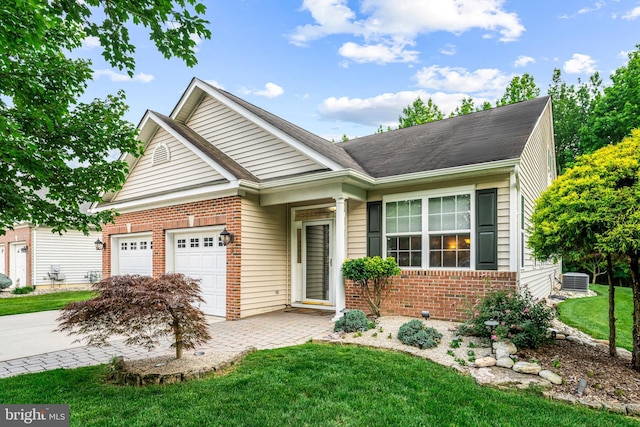 5 Fisher Ct, Sewell, NJ 08080 - view of front of property with brick siding, a garage, driveway, a front lawn, and a shingled roof