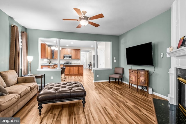 5 Fisher Ct, Sewell, NJ 08080 - living area with light wood-type flooring, a fireplace, ceiling fan, and recessed lighting