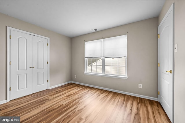 5 Fisher Ct, Sewell, NJ 08080 - unfurnished bedroom featuring wood finished floors and a closet