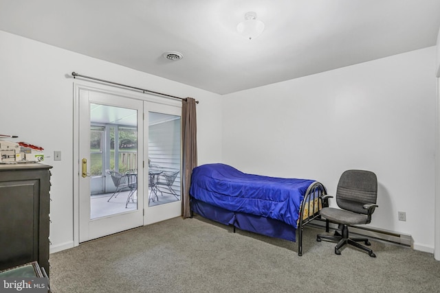 28 Abbey Ct, Carlisle, PA 17015 - bedroom with carpet floors, access to exterior, and a baseboard radiator