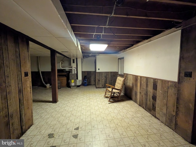 475 Company Farm Rd, Aspers, PA 17304 - finished below grade area featuring a wainscoted wall, light flooring, wood walls, and heating unit