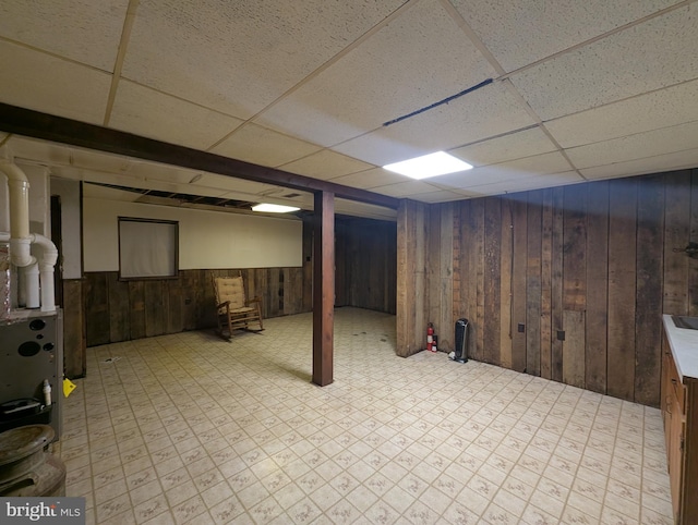 475 Company Farm Rd, Aspers, PA 17304 - finished basement featuring a paneled ceiling, wood walls, tile patterned floors, and a wainscoted wall