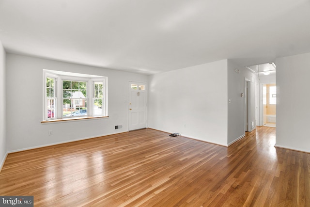 1028 Marleigh Cir, Baltimore, MD 21204 - empty room with attic access and light wood-style flooring