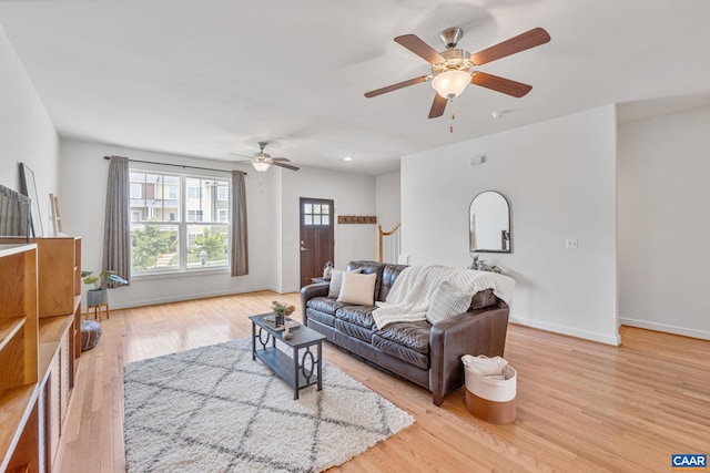 1254 Haden Pl, Crozet, VA 22932 - living area with light wood-style floors and a ceiling fan