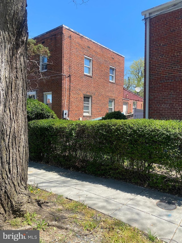 1025 47th Pl NE, Washington, DC 20019 - view of side of property featuring brick siding