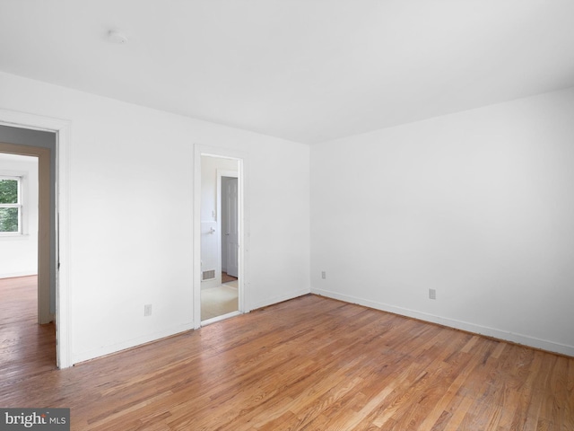 407 Owls Nest Rd, Wilmington, DE 19807 - spare room with light wood finished floors and a smoke detector