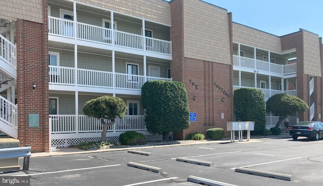 718 Mooring Rd Unit B203, Ocean City, MD 21842 - view of property featuring uncovered parking
