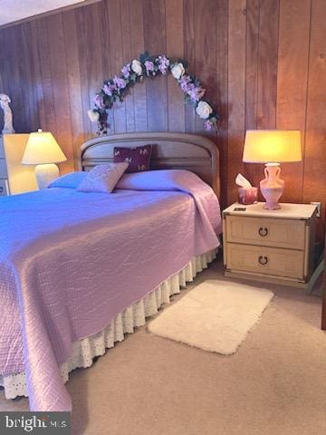 718 Mooring Rd Unit B203, Ocean City, MD 21842 - bedroom with carpet flooring and wooden walls