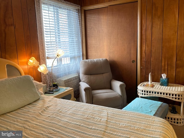 718 Mooring Rd Unit B203, Ocean City, MD 21842 - bedroom featuring wooden walls and a closet