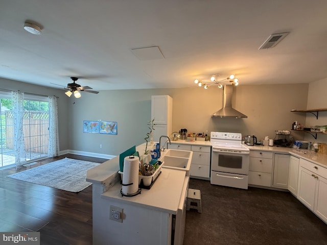 1545 Russett Dr, Warminster, PA 18974 - kitchen with electric range, wall chimney range hood, white cabinets, light countertops, and a ceiling fan