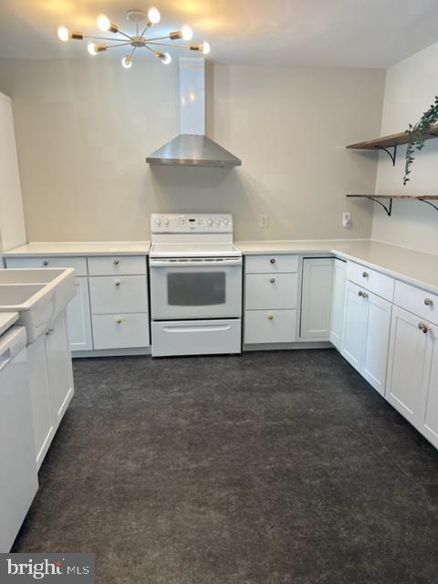 1545 Russett Dr, Warminster, PA 18974 - kitchen with white appliances, wall chimney range hood, open shelves, and white cabinetry