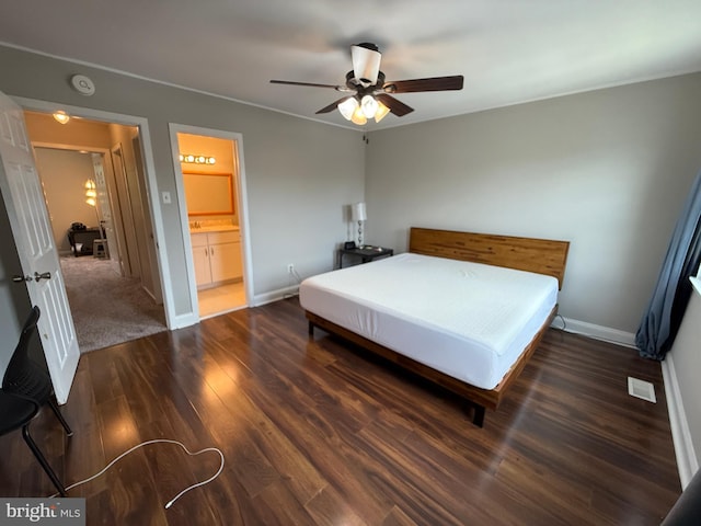 1545 Russett Dr, Warminster, PA 18974 - bedroom with wood finished floors, ensuite bath, and a ceiling fan