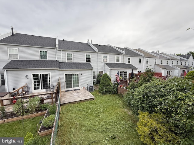 1545 Russett Dr, Warminster, PA 18974 - back of house with a vegetable garden, a residential view, a shingled roof, and a deck