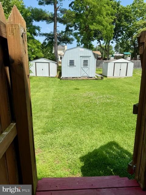 56 W Bishop Ln, Smithsburg, MD 21783 - view of green lawn featuring a shed